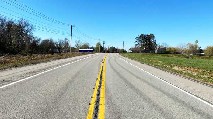 Long wide roadway with shoulders
